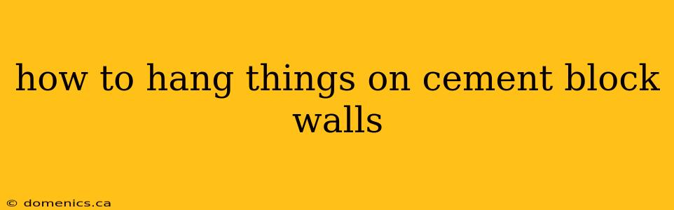 how to hang things on cement block walls